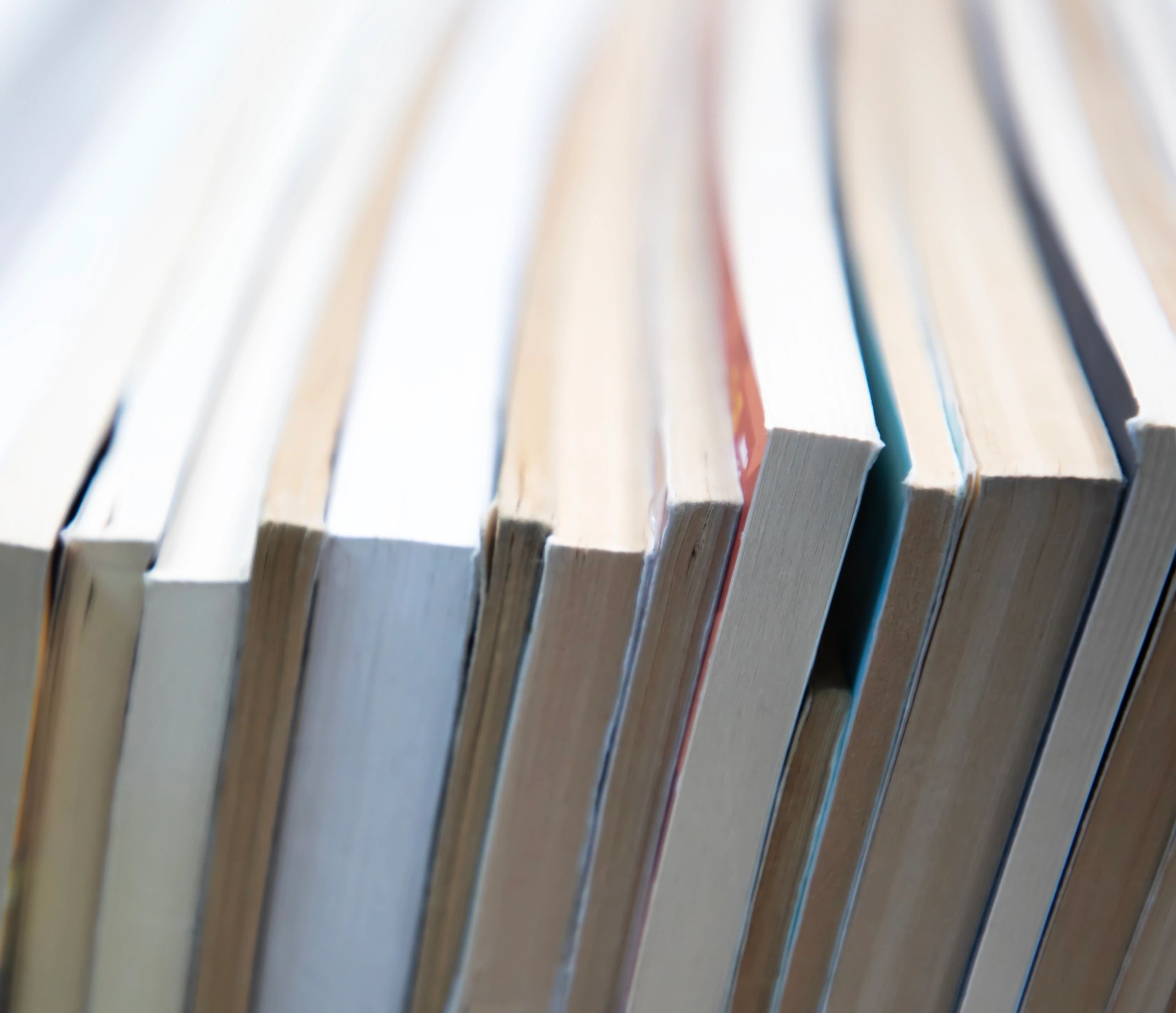 Stacked books on a shelf